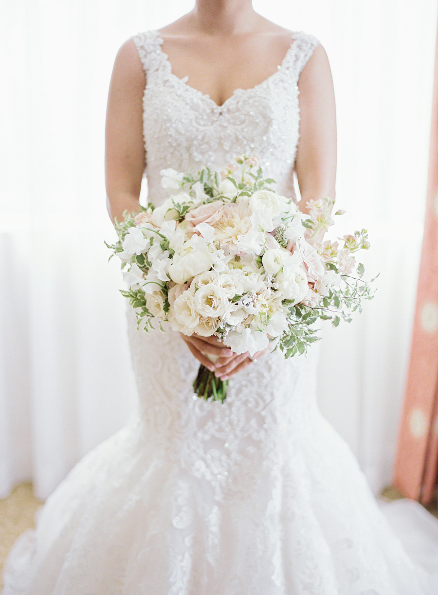 film image of brides white bouquet by La Petit Fleur