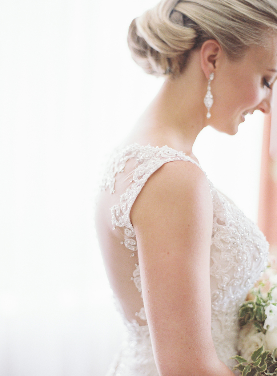 close up of brides lace dress