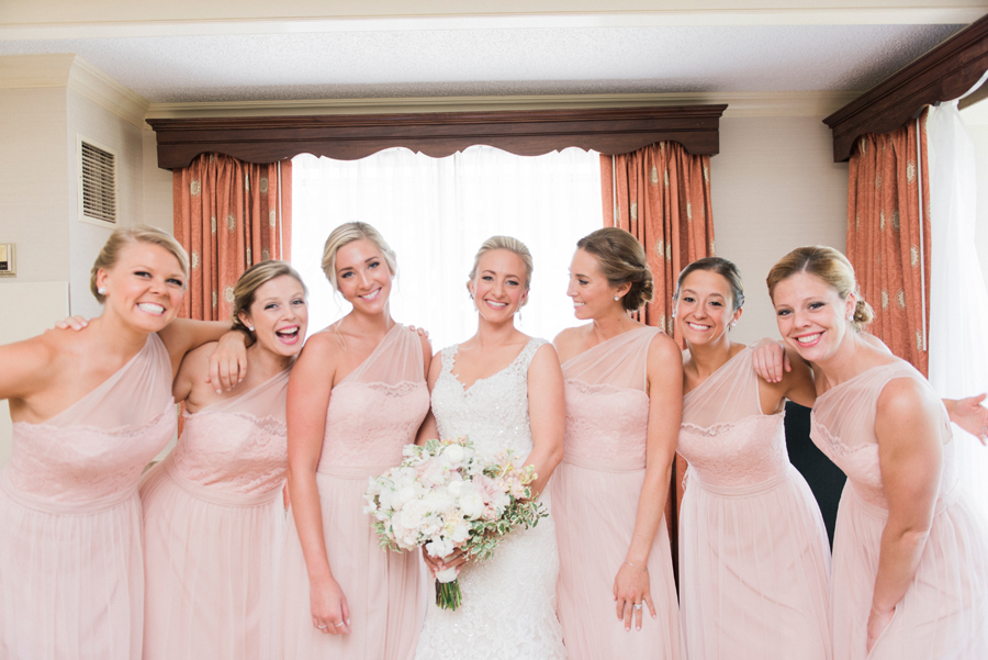 Portrait of bride with her bridesmaids