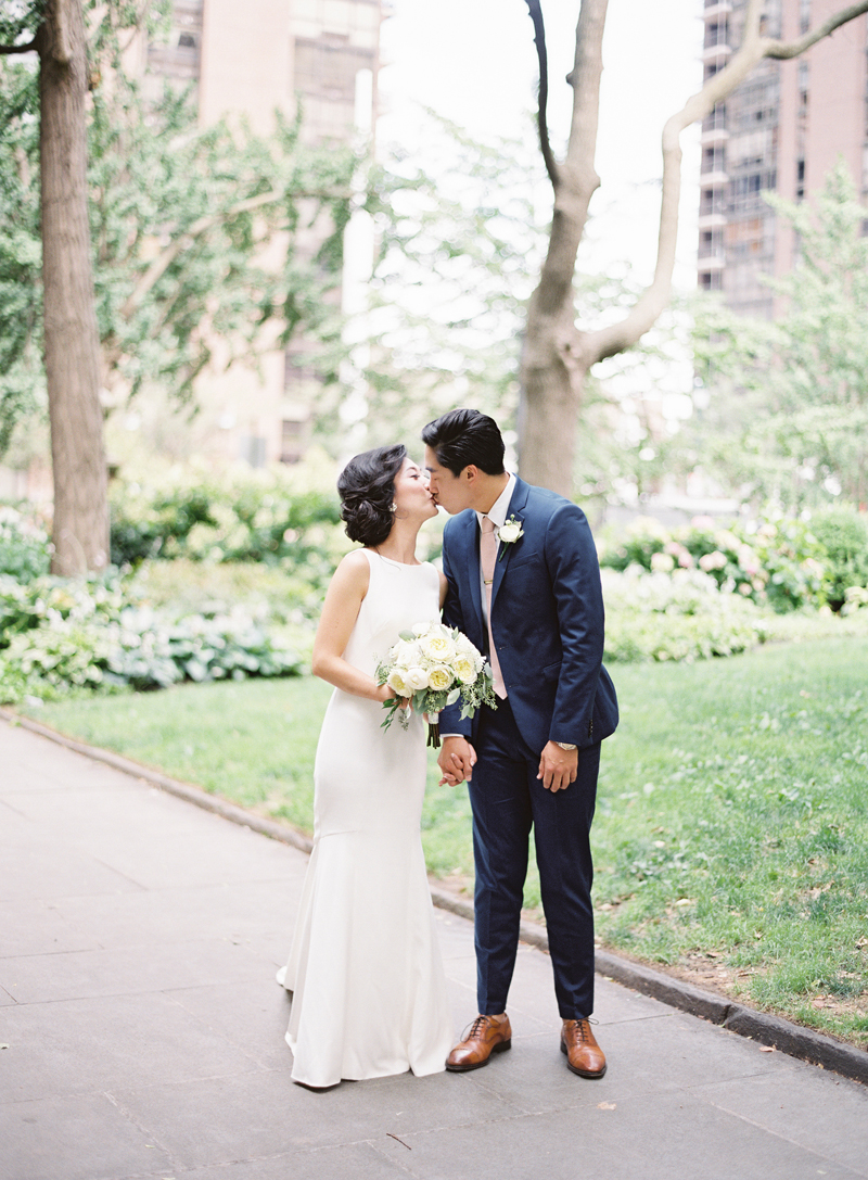 bride and groom kissing in Washington Square Park Philadelphia