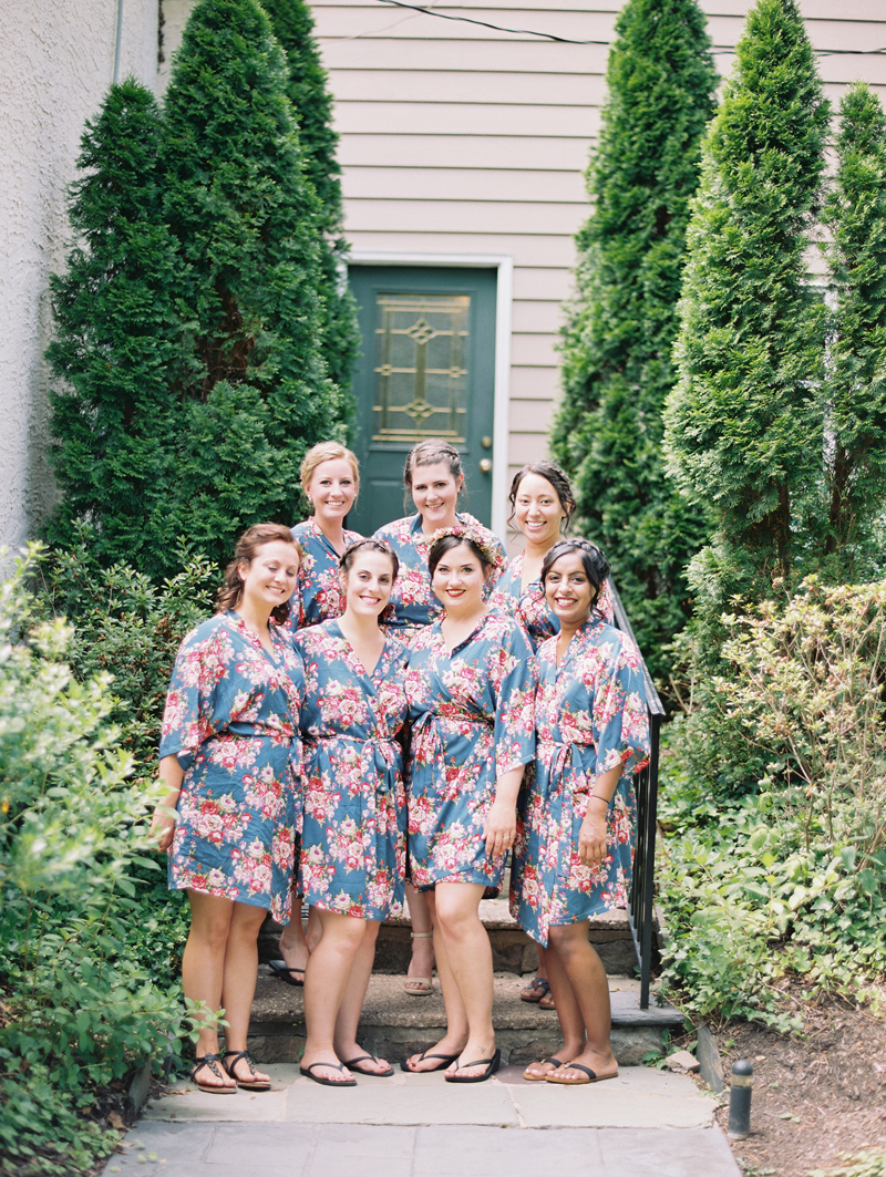 Bride with bridesmaids in blue floral robes
