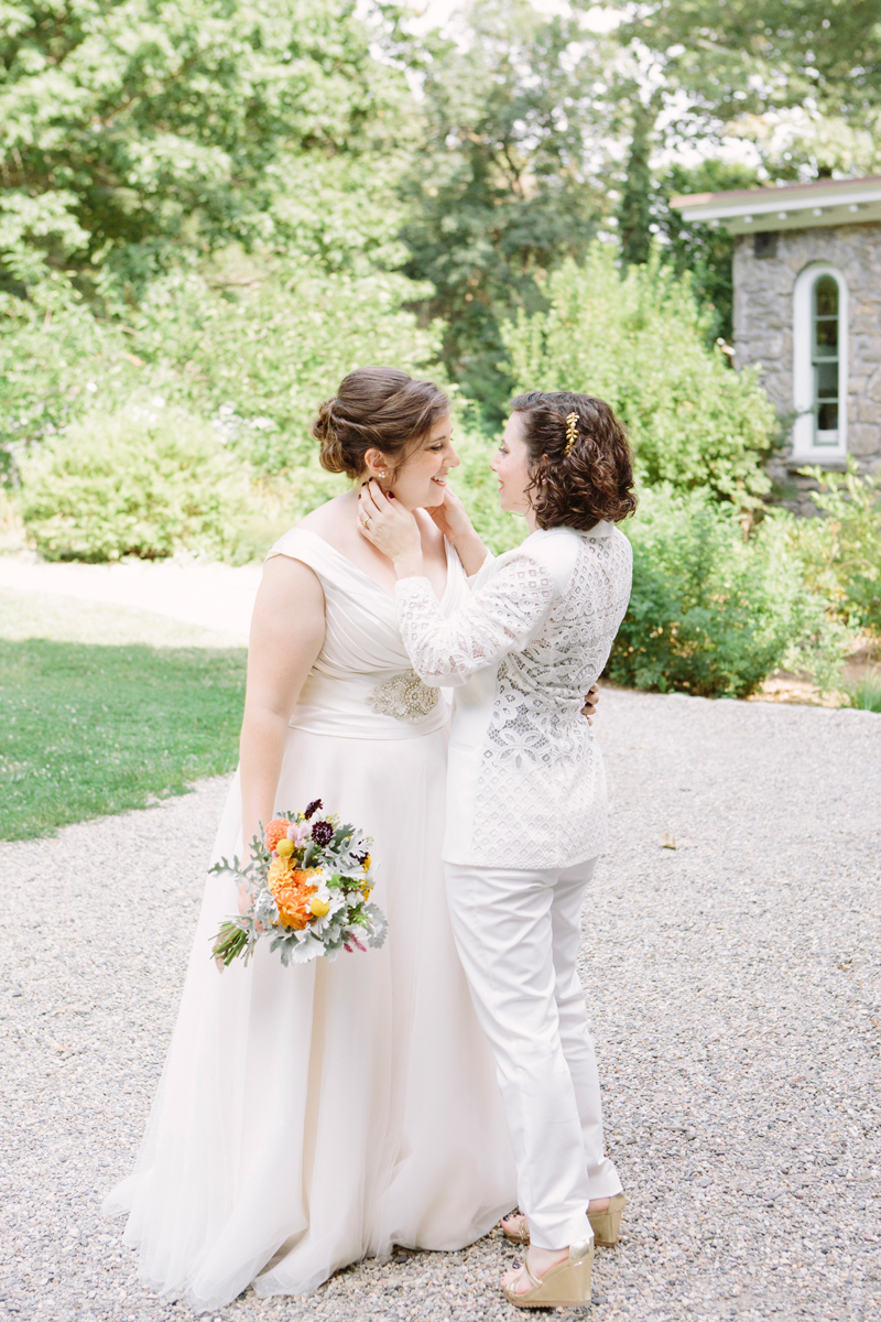 Alyssa and Rachel at their first look at Awbury Arboretum Wedding