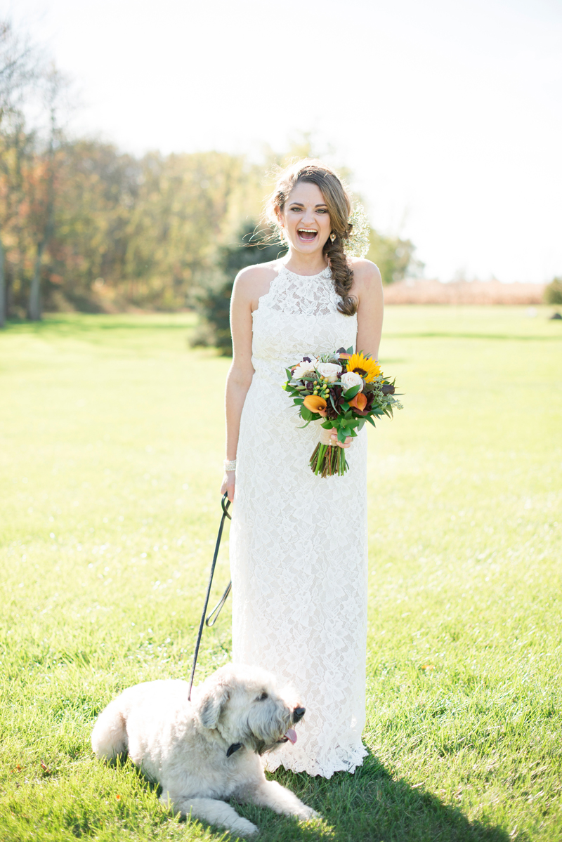 Bride with her dog on her wedding day, BHLDN lace dress